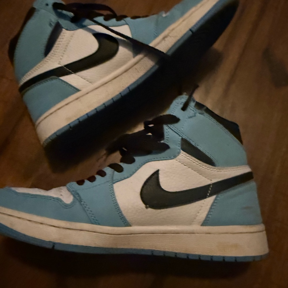 Men’s Nike Air Force one.  Blue white and black.